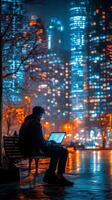 City dweller working on laptop at night in urban park with glowing skyscrapers photo