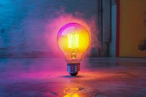 Colorful light bulb with vibrant smoke effect illuminating dark space photo