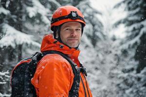 Mountain climber in orange gear prepares for a snowy ascent in winter wilderness photo