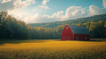 Red barn surrounded by green hills and grazing cows on a cloudy day photo
