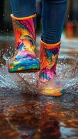 Colorful boots making splashes in puddles during a rainy day photo