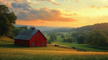 Red barn surrounded by green hills and grazing cows on a cloudy day photo