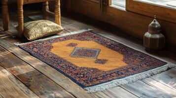 Intricate rug with an open book and decorative lantern in a cozy reading corner photo