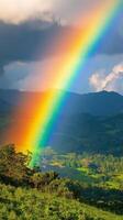 Vibrant rainbow cascading through the clouds during sunset over a serene sky photo