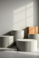 minimalist display with cylindrical forms wooden block photo