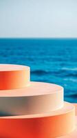 three-tiered circular platforms against an ocean view photo