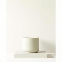 cylindrical container on square block photo