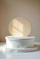 two-tiered circular display with an oval backdrop photo