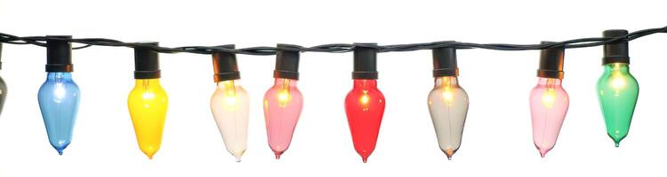 string colorful teardrop-shaped light bulbs illuminates with a warm festive glow. photo