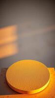 golden circular platform with square base photo