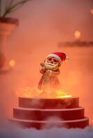 joyful figurine on a three-tiered display photo