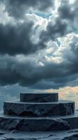 three-layered stone platform against a cloudy sky photo