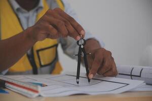 Image of engineer meeting for architectural project. working with partner and engineering tools on workplace vintage tone. photo