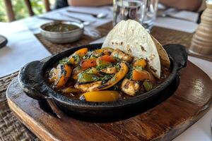 Delicious Chicken Fajitas with Bell Peppers and Tortilla photo