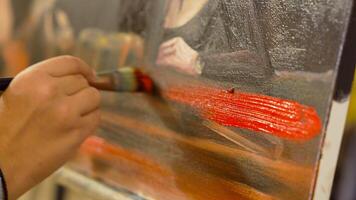 Artistic process of painting a detailed portrait in a studio setting video