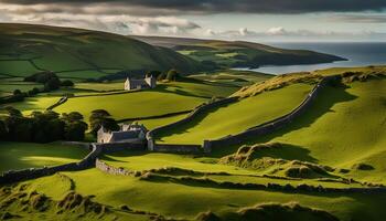 A Tranquil View of the Countryside with Stone Walls and Rolling Green Hills photo