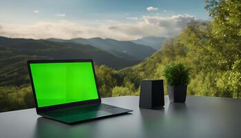 Laptop on a Table with a Mountain View photo