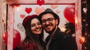 un alegre Pareja poses juntos en frente de un vistoso fondo adornado con corazones y globos ellos son feliz, compartiendo un momento de afecto, vestido por casualidad mientras celebrando amor. foto