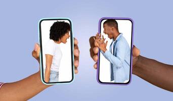 A couple engages in a heated conversation through their smartphones, conveying strong emotions while chatting. Their faces show tension as they express their feelings in different locations. photo