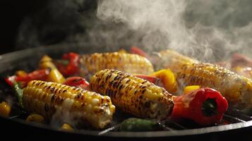 Fresh corn and colorful peppers sizzle on a hot grill, releasing aromatic steam. Smoke rises as the summer sun sets, creating a perfect atmosphere for outdoor cooking and enjoyment. photo
