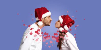 A couple in matching Santa hats leans in to share a loving kiss, surrounded by heart-shaped decorations. Their joyful expression captures the spirit of celebration during the holiday season. photo