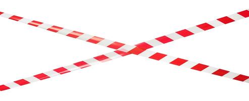 Red and white lines of barrier tape, protects for no entry, isolated on white background photo