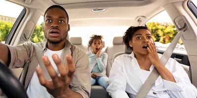Car Accident. Shocked African American Family Driving Automobile Having Problem And Risk Of Auto Crash Riding In City. Transportation And Traffic Issues Concept. Selective Focus photo