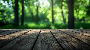 A wooden table with a view of trees in the background photo