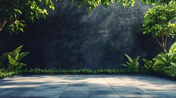 A large empty space with a wall and a tree in the background photo