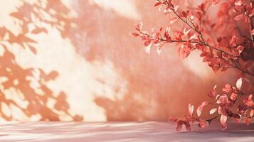A pink tree with leaves casting a shadow on a wall photo