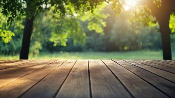 A wooden table with a view of trees and grass photo