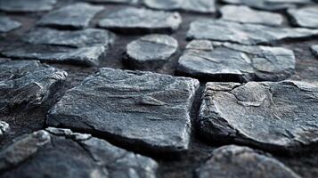 A close up of a stone walkway with a grey and blue color scheme photo