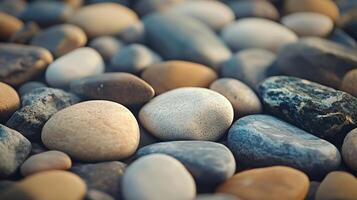 A collection of rocks of various sizes and colors, with some of them being gray photo