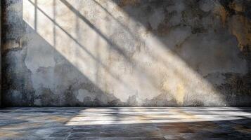 A large, empty room with a window that lets in sunlight photo