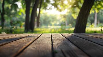 A wooden table with a view of trees and grass photo