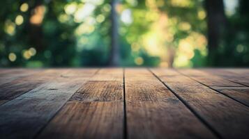 A wooden table with a view of trees in the background photo