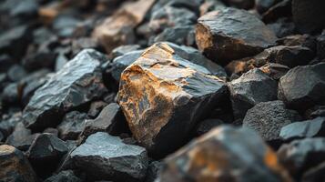 A pile of rocks with a few of them being larger than the rest photo