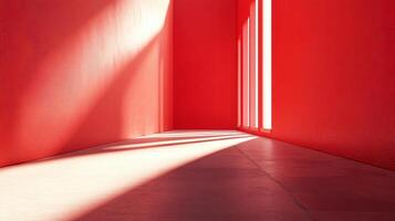 A red room with a window that is letting in sunlight photo