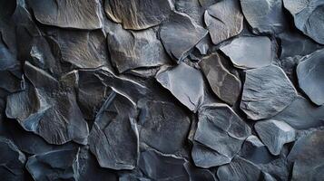 A close up of a pile of rocks with a rough texture photo
