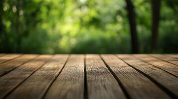 A wooden table with a view of trees in the background photo