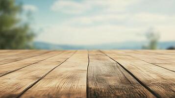 A wooden table with a view of the mountains in the background photo