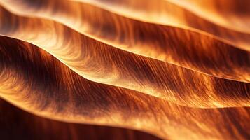 The image is a close up of a sandy beach with a wave pattern photo