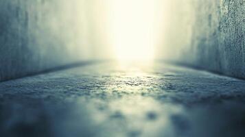 A blurry image of a hallway with a light shining through a window photo