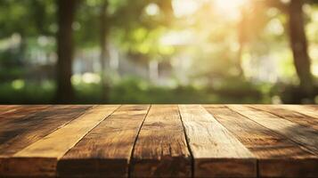 A wooden table with a view of trees and a bright sunny day photo