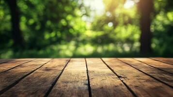A wooden table with a view of trees in the background photo