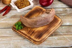 Steamed pork tongue with mustard photo