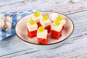 Watermelon with feta and grape photo