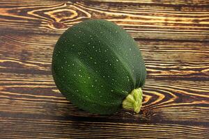 Raw green round zucchini vegetable photo