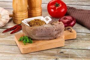 Steamed pork tongue with mustard photo
