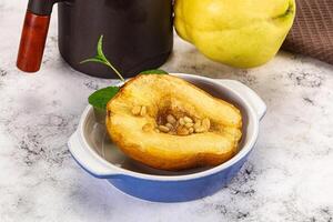 Baked quince with honey and cedar photo